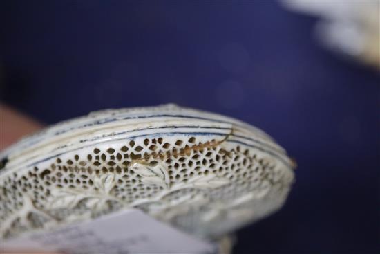 Two 19th century Chinese ivory pomanders and a similar purse